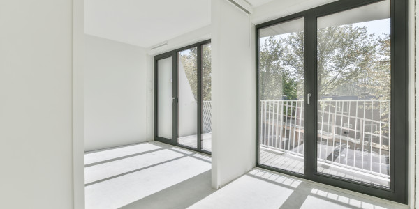 Carpintería Metálica de Aluminio / PVC en Terrassa · Bloqueador Central de Hoja